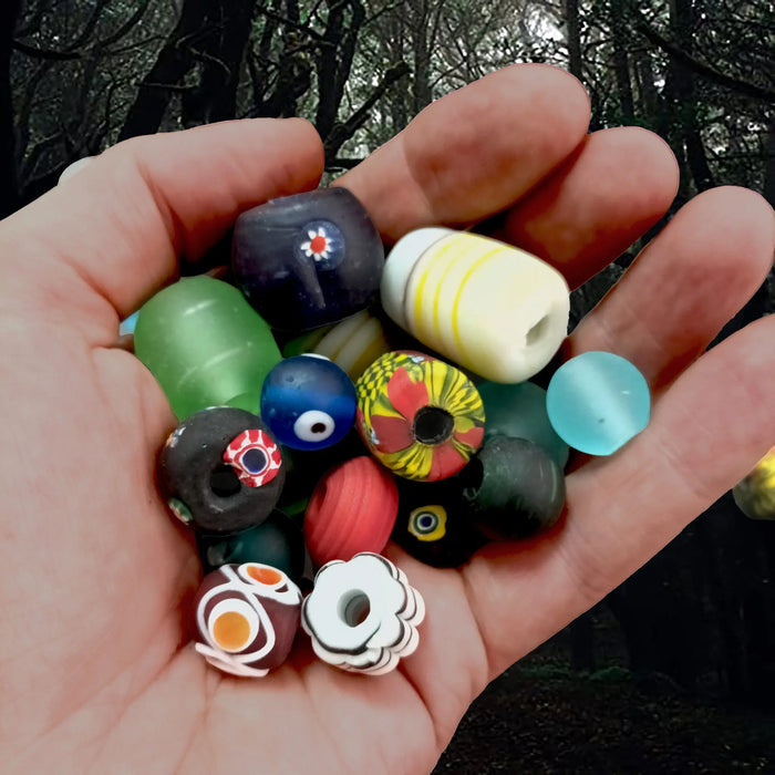 Assorted Handmade Glass Viking Beads From Birka in Hand