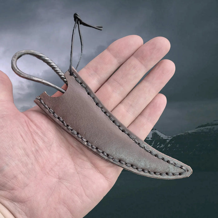 Authentic Hand-Forged Replica Iron Age Woman's Knife in Handmade Leather Sheath on Hand