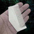 Authentic Handmade Replica Viking Bone Comb in a Triangular Shape on Hand