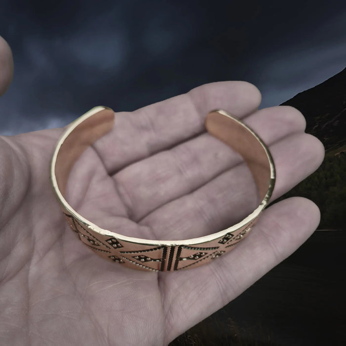 Bronze Hiberno-Norse Viking Bracelet / Arm Ring Replica with 4 Dot Design on Hand - Above Angle View