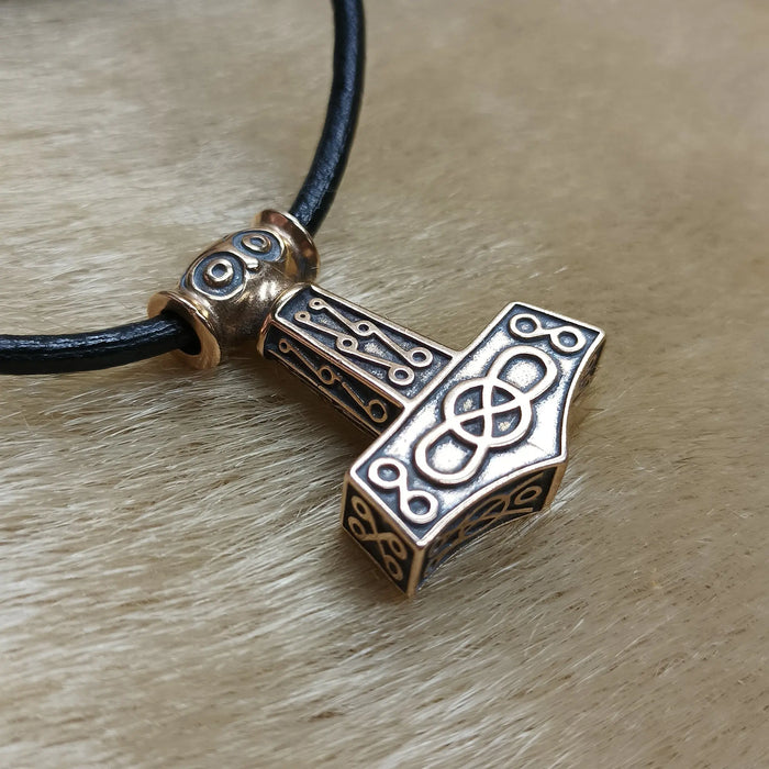 Bronze Odeshög Thors Hammer Pendant on Leather Thong - On Fur - Side View
