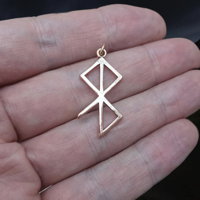 Solid Bronze Peace & Happiness Bind Rune Viking Pendant on Hand