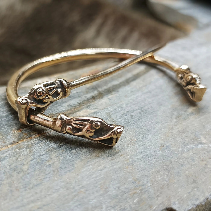 Bronze Penannular Brooch with Gotlandic Dragon Heads on Rock - Side View