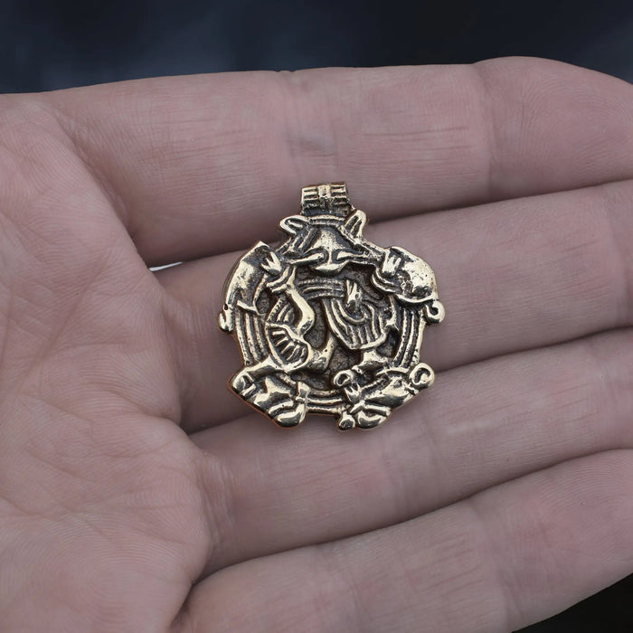 Solid Bronze Replica Viking Gripping Beats Pendant from&nbsp; 10th century Sweden on Hand