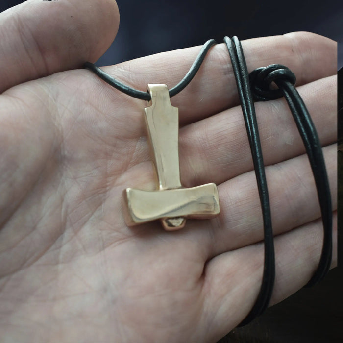 Bronze Replica Thors Hammer Pendant from Läby, Sweden on Leather Cord, on Hand