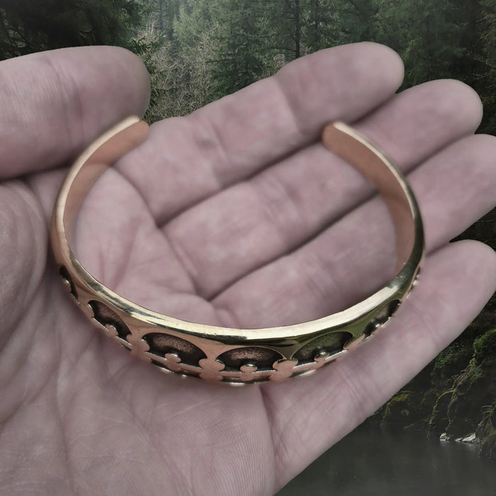 Bronze Viking Arm Ring / Bracelet Replica from Gotland, Sweden on Hand - Above Angle View
