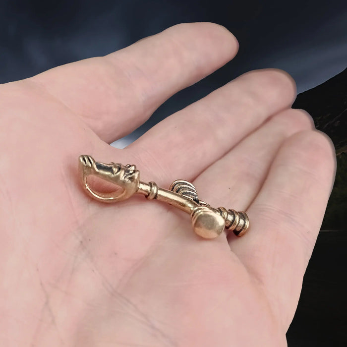 Bronze Wolf Cross Thors Hammer Pendant on Hand  - Side Angle View