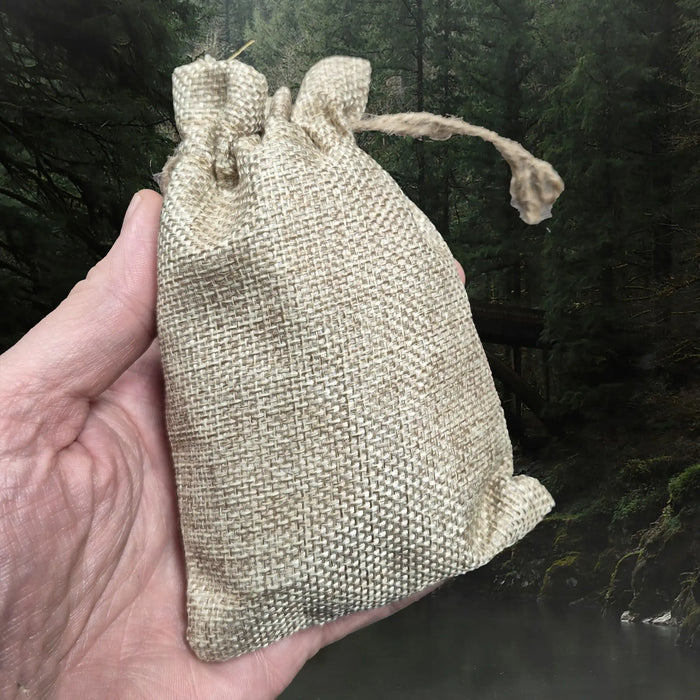 Complete Elder Futhark White Willow Rune Set in Hessian Pouch, on Hand