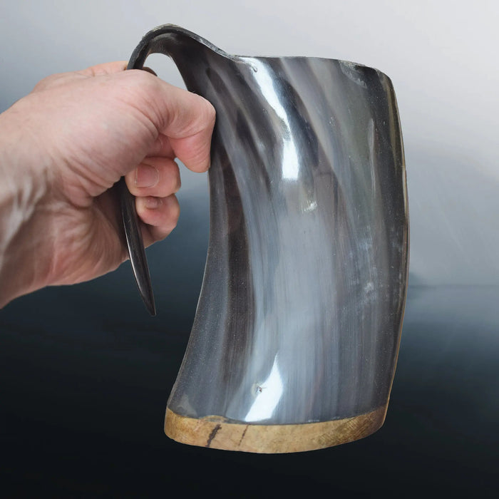 Large Polished Ox Horn Beer Mug in Hand - Side View