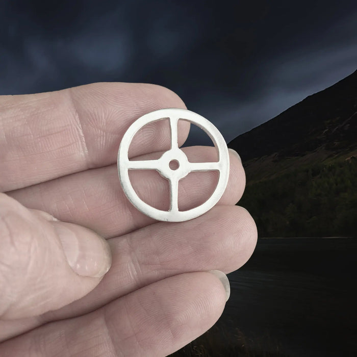 Handmade Replica Viking Sun Cross Odin Pendant in Sterling Silver on Fingertips