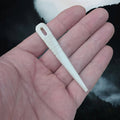 Handmade Bone Viking Nalbinding Needle in Smaller Size with Hand-Carved Decorations on Hand