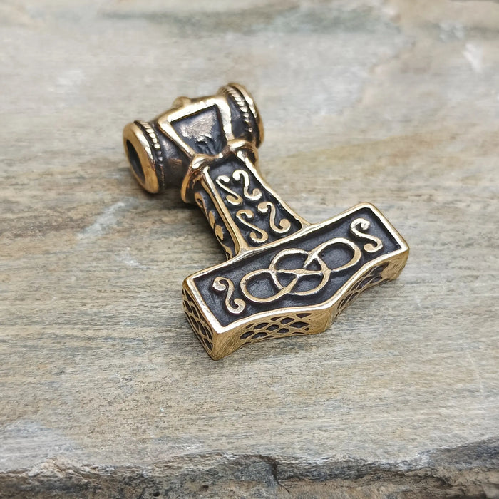 Large Bronze Thors Thunder Hammer Pendant on Rock - Back Angle View
