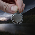 Large Silver Gotland Crystal Lens Pendant in Fingers