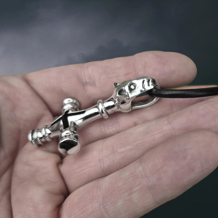 Large Silver Icelandic Wolf Cross Hammer Replica Pendant on Leather Cord, on Hand - Side View