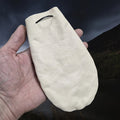 Medium Sized Natural Veg-Tan Leather Viking Pouch with Leather Drawstring on Hand