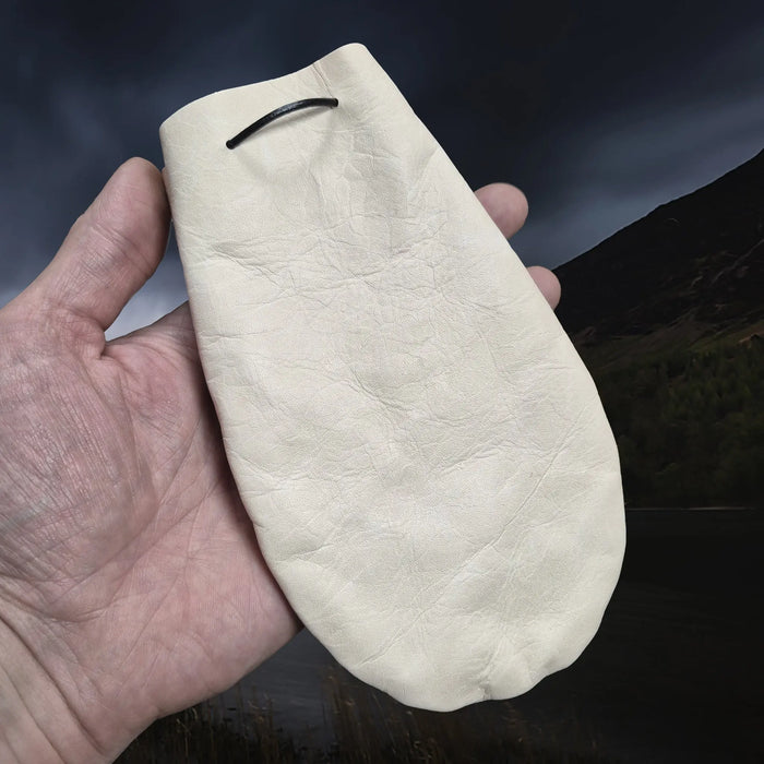 Medium Sized Natural Veg-Tan Leather Viking Pouch with Leather Drawstring on Hand