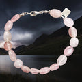 Silver Viking Bracelet Made From Cut and Polished Rose Quart Beads