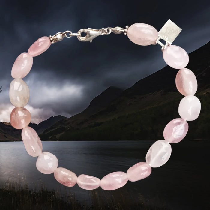Silver Viking Bracelet Made From Cut and Polished Rose Quart Beads