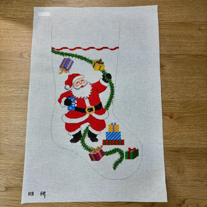 Santa with Garland and Presents Stocking