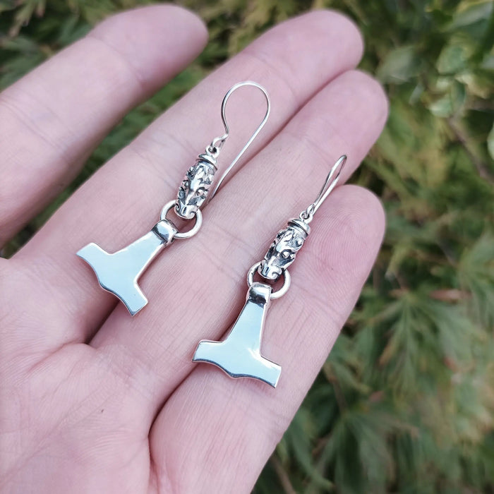 Silver Gotland Dragon Thors Hammer Earrings in Hand - Different Angle