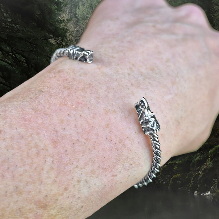 Slim Twisted Silver Viking Bracelet Replica With Gotlandic Dragon Heads on Wrist - Angle View