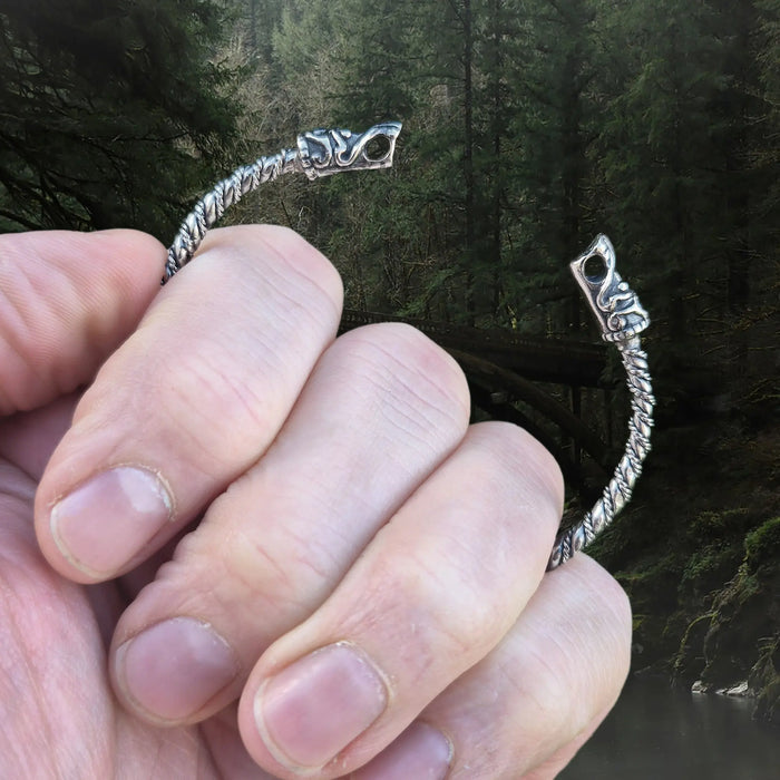 Slim Twisted Silver Viking Bracelet Replica With Gotlandic Dragon Heads in Hand