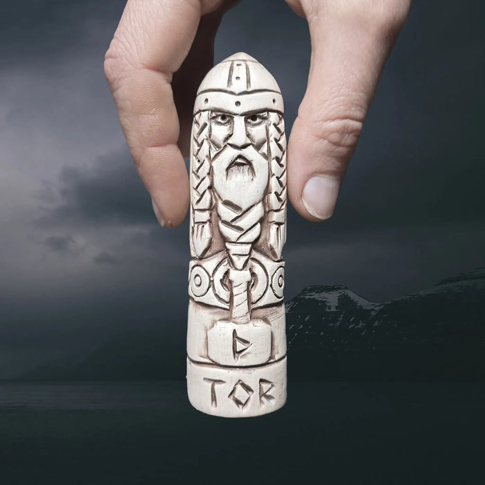 Statuette of the Norse God Thor in Hand-Crafted Clay with Hand for Scale