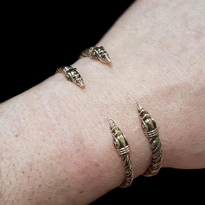 Twisted Bronze Bracelets With Raven Heads on Wrists