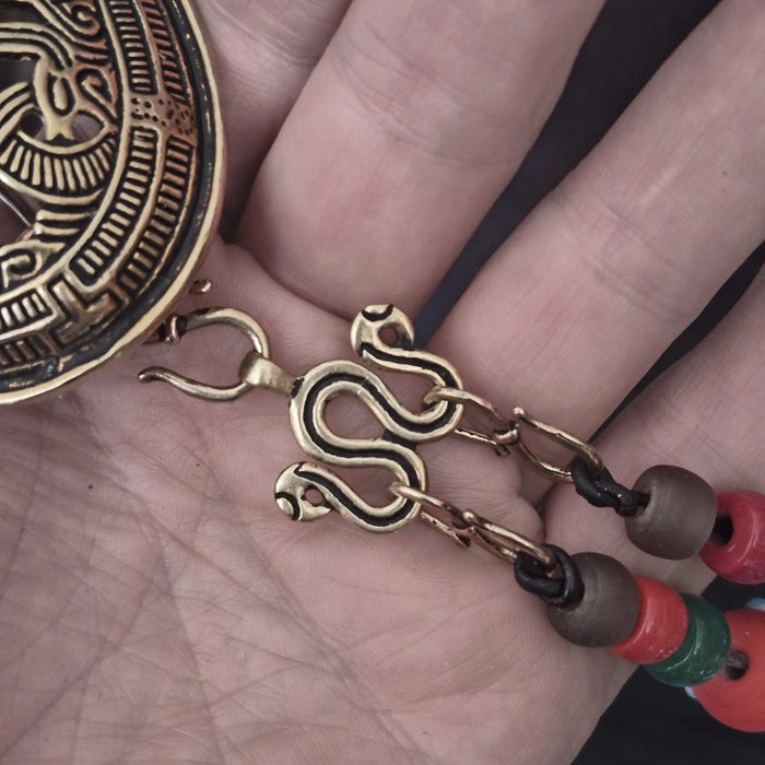Viking Age Replica Bronze Serpent Bead Divider from Sweden with Bronze Hooks, Glass Viking Beads and Bronze Jelling Tortoise Brooch on Hand
