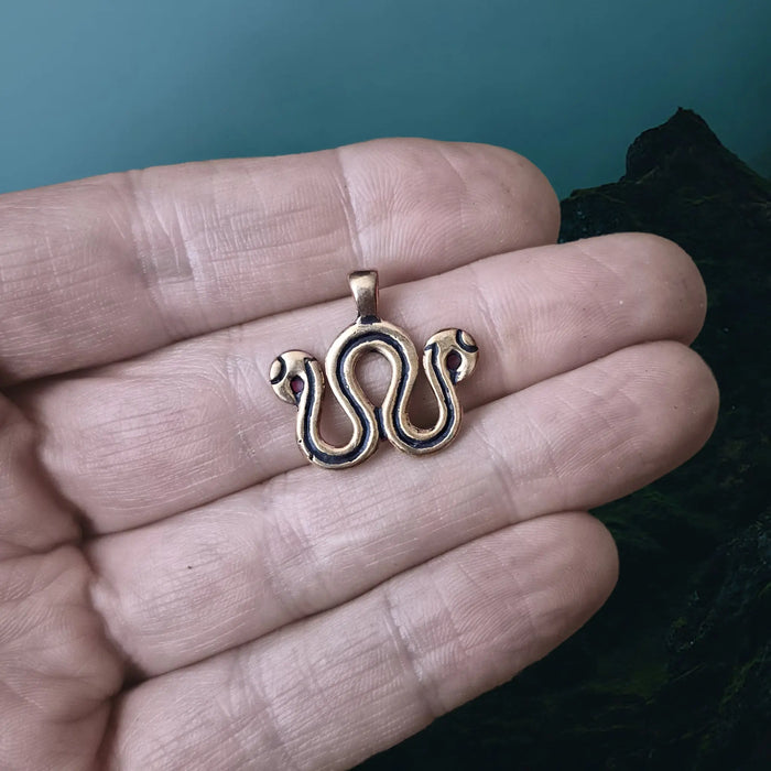 Viking Age Replica Bronze Serpent Bead Divider from Sweden on Hand